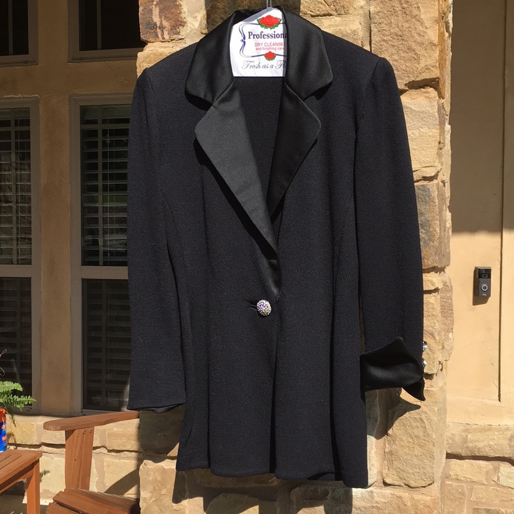 Black evening jacket w/silk collar/cuffs.